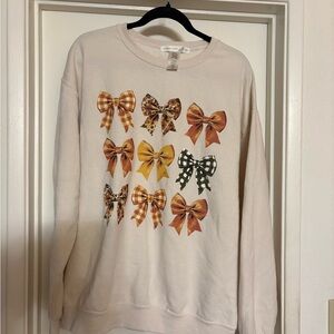 Altar'd State Cream Sweater with Bow Patterns